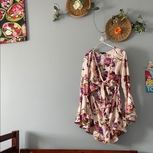 Floral romper with flared sleeves